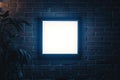 Square Illuminated Frame Mounted on Dark Brick Wall Royalty Free Stock Photo