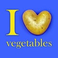 Heart-shaped potatoes in the form of a stylized inscription `I love vegetables`.