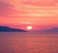 Red sunset over the sea with sun in the centre, square Royalty Free Stock Photo