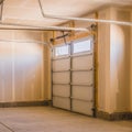 Square Interior of a garage under construction with unfinished walls