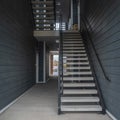 Square Internal stairs from a ground floor foyer