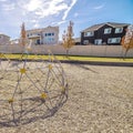 Square Kids climbing dome in an urban playground Royalty Free Stock Photo