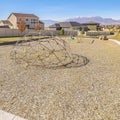 Square Kids playground with climbing dome in urban park Royalty Free Stock Photo