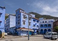 Square with lamp pole in Chefchaouen, a city in northwest Morocco noted for its buildings in shades of blue.