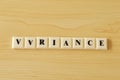 Square letters with text VARIANCE. Top view Royalty Free Stock Photo