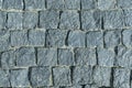 Square lined with cobblestone or stone pavement, walkway or road. Royalty Free Stock Photo