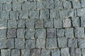 Square lined with cobblestone or stone pavement, walkway or road. Royalty Free Stock Photo