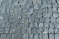 Square lined with cobblestone or stone pavement, walkway or road. Royalty Free Stock Photo