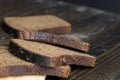 Square loaf of black rye bread Cut into pieces