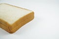 Square loaf of bread on a white background