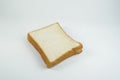 Square loaf of bread on a white background