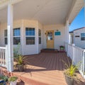 Square Long covered wooden entrance porch day light Royalty Free Stock Photo