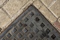 Square manhole cover on the sidewal texture Royalty Free Stock Photo