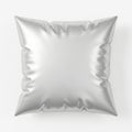 A square metallic pillow with a shiny silver surface and a quilted pattern Royalty Free Stock Photo