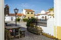 Square with a monument in small traditional village called Vila Fernando in Alentejo  Portugal Royalty Free Stock Photo