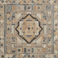 A square mosaic pattern featuring intricately arranged geometric shapes, primarily Royalty Free Stock Photo