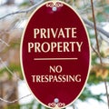 Square Oval shape Private Property No Trespassing sign with red and white colors