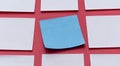Minimalist Grid Mockup of Square White and Blue Paper Notes on Red Textured Background for Creative Copy Space Royalty Free Stock Photo