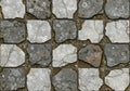 Square paving stones form a grid pattern. Each stone is gray with notable light Royalty Free Stock Photo