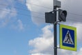 Square pedestrian crossing road sign blue and yellow.. Royalty Free Stock Photo