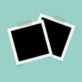Square photo frames with sticky tape on green background. Royalty Free Stock Photo