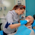 Square photo of patient on the examination of the teeth at the d