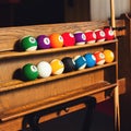Square photo Set of balls for a game of pool billiards on shelve Royalty Free Stock Photo