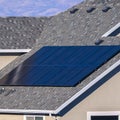 Square Photovoltaic solar panel on a house roof Royalty Free Stock Photo