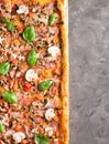 Square pizza with basil tomatoes and mushrooms