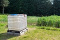 Square plastic water tank in the garden.rainwater recuperator baril