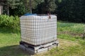 Square plastic water tank in the garden.rainwater recuperator baril