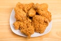 Square Plate of Fried Chicken on Wood Table Royalty Free Stock Photo