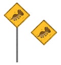 Square road sign of a brown carnivorous dinosaur with big claws