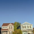 Square Row of three houses on a modern urban estate Royalty Free Stock Photo