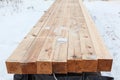 Square-sawn timber for wooden house construction. Dry planed inscriptions as stamp