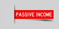 Square red color sticker in word passive income insert on gray background