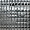 Square Serenade: An image of a geometric pattern created with squares, in a mix of bold and muted colors3, Generative AI