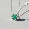 Emerald creating a striking visual contrast against the subtle Royalty Free Stock Photo
