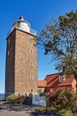 Square-shaped Svaneke Lighthouse built in 1920 on the coast of Baltic Sea, Bornholm island, Denmark.