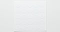 A square sheet of circular white stickers, organized in a 5x5 grid pattern, rests on a Royalty Free Stock Photo