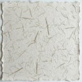 Square sheet of handmade paper featuring a natural, textured surface with visible Royalty Free Stock Photo