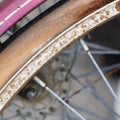 Square size - Close-up of vintage bicycle tire with spokes and rust Royalty Free Stock Photo