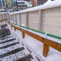 Square Snowy outdoor stairs overlooking Park City Utah community in winter