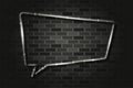 Square speech bubble glows with white light neon sign or LED strip light on a black brick wall. Realistic vector art Royalty Free Stock Photo
