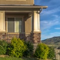 Square Stairs leading to porch and front door with sidelight at the entrance of home Royalty Free Stock Photo