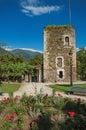 Square, stone building and flowery garden in city center of Conflans Royalty Free Stock Photo