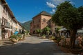 Square with stone building and shops in the city center of Conflans Royalty Free Stock Photo