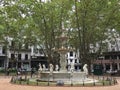 Square surrounded by statues and trees Royalty Free Stock Photo