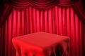 Square table and red curtain background