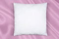 Square Throw Pillow Mockup on Light Pink Fabric Background Royalty Free Stock Photo
